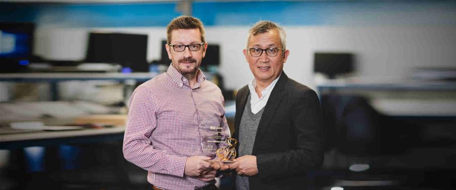Impulse presented with award for 'Best UK sales increase' by Axiomtek
